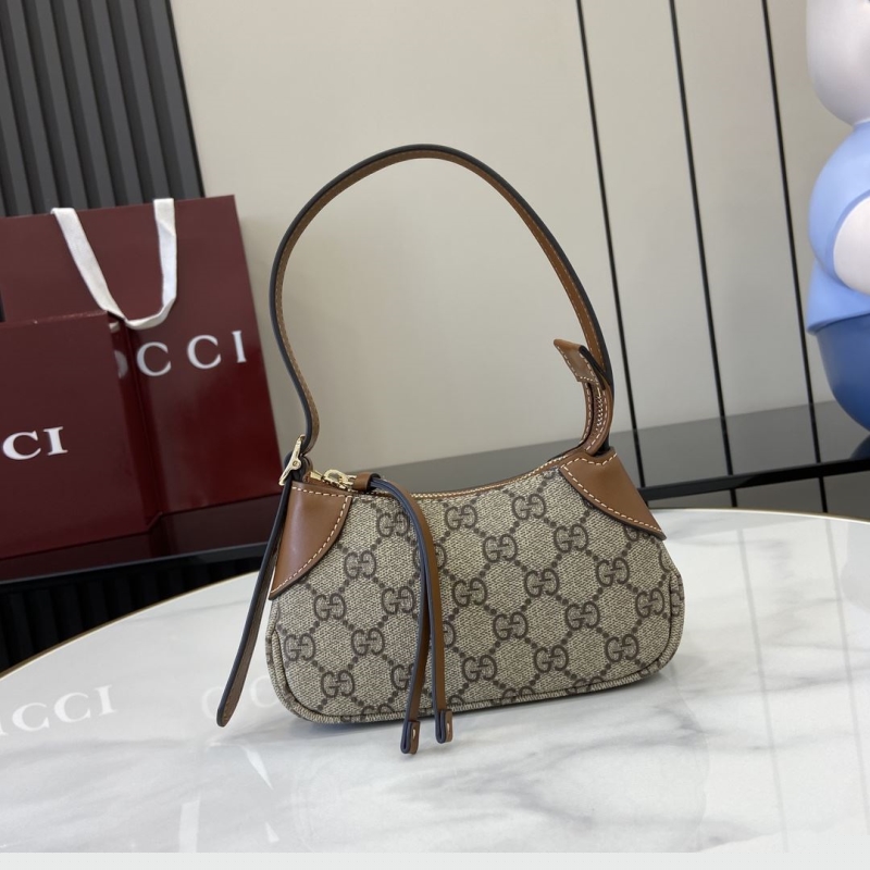 G*u*i top handle bags